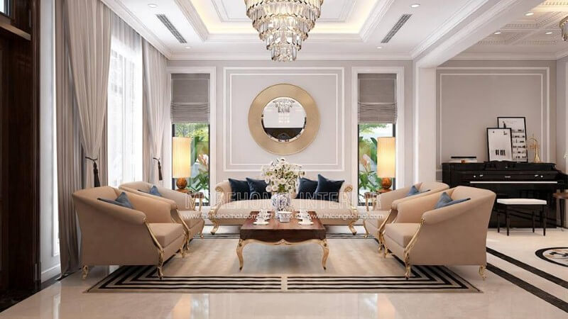 Bộ bàn ghế sofa tân cổ điển mạ vàng gam màu trắng sữa nhẹ nhàng nhưng lại tạo điểm nhấn đẹp, sang trọng cho phòng khách. Thiết kế phòng khách biệt thự