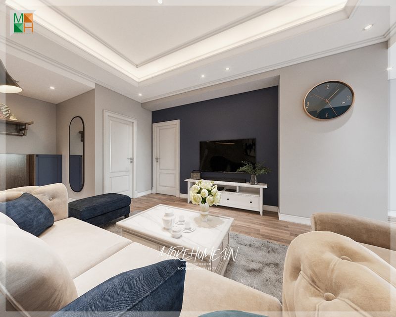 Phòng khách chung cư hiện đại với sofa nỉ đẹp, bàn trà tinh tế và kệ tivi màu trắng sang trọng làm nên sự sang trọng.